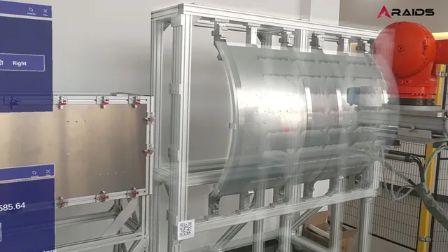 Curved aircraft panel in an extrusion frame, with AR drill-position overlays and an industrial robot.