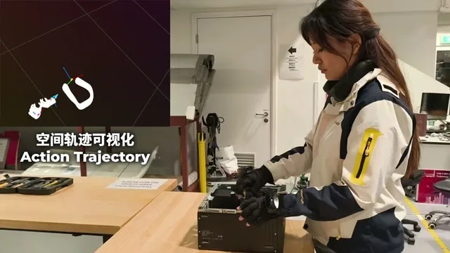 First-person recording of gloved hands working in a PC chassis, with an action-trajectory overlay.