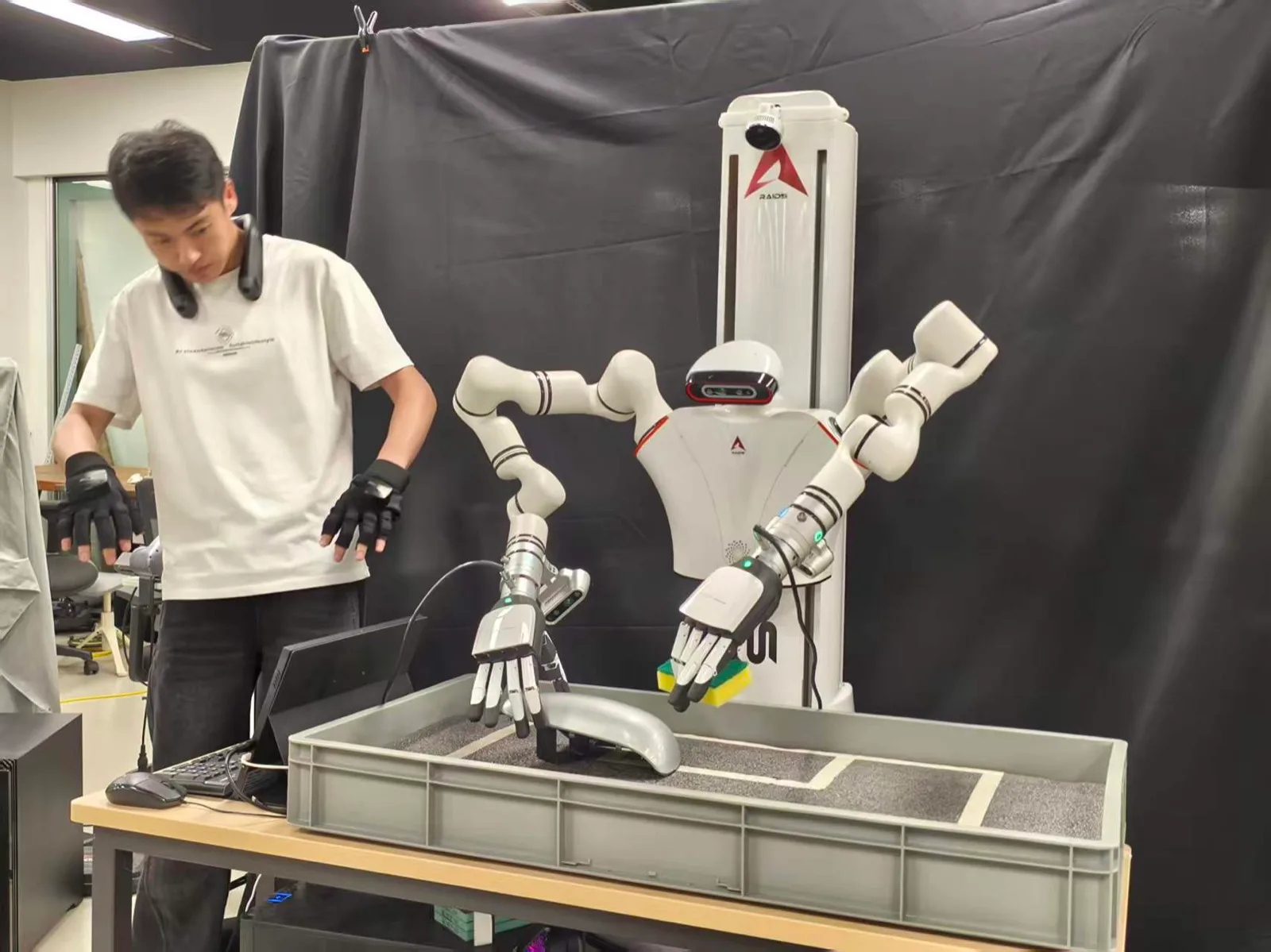 Teleoperating a dual-arm dexterous robot during a contact-rich polishing task.